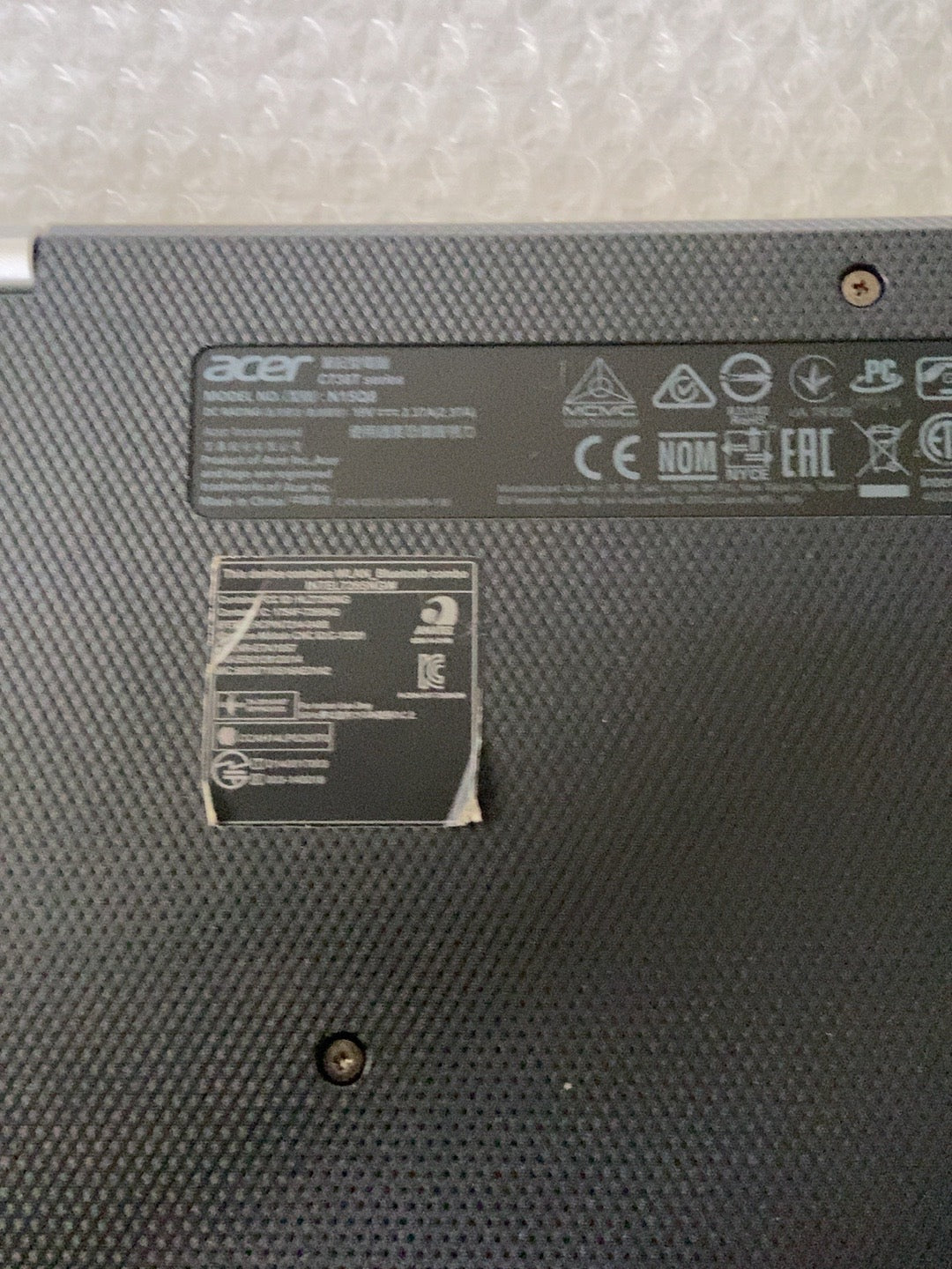 Acer Chromebook R11 C738T-C44Z original underside regulatory label and cosmetic condition