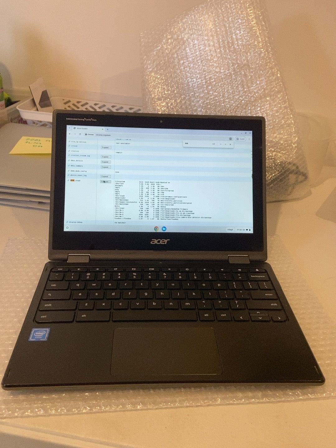 Acer Chromebook Spin 511 R752T-C3M5 front open view showing actual unit and ChromeOS system screen