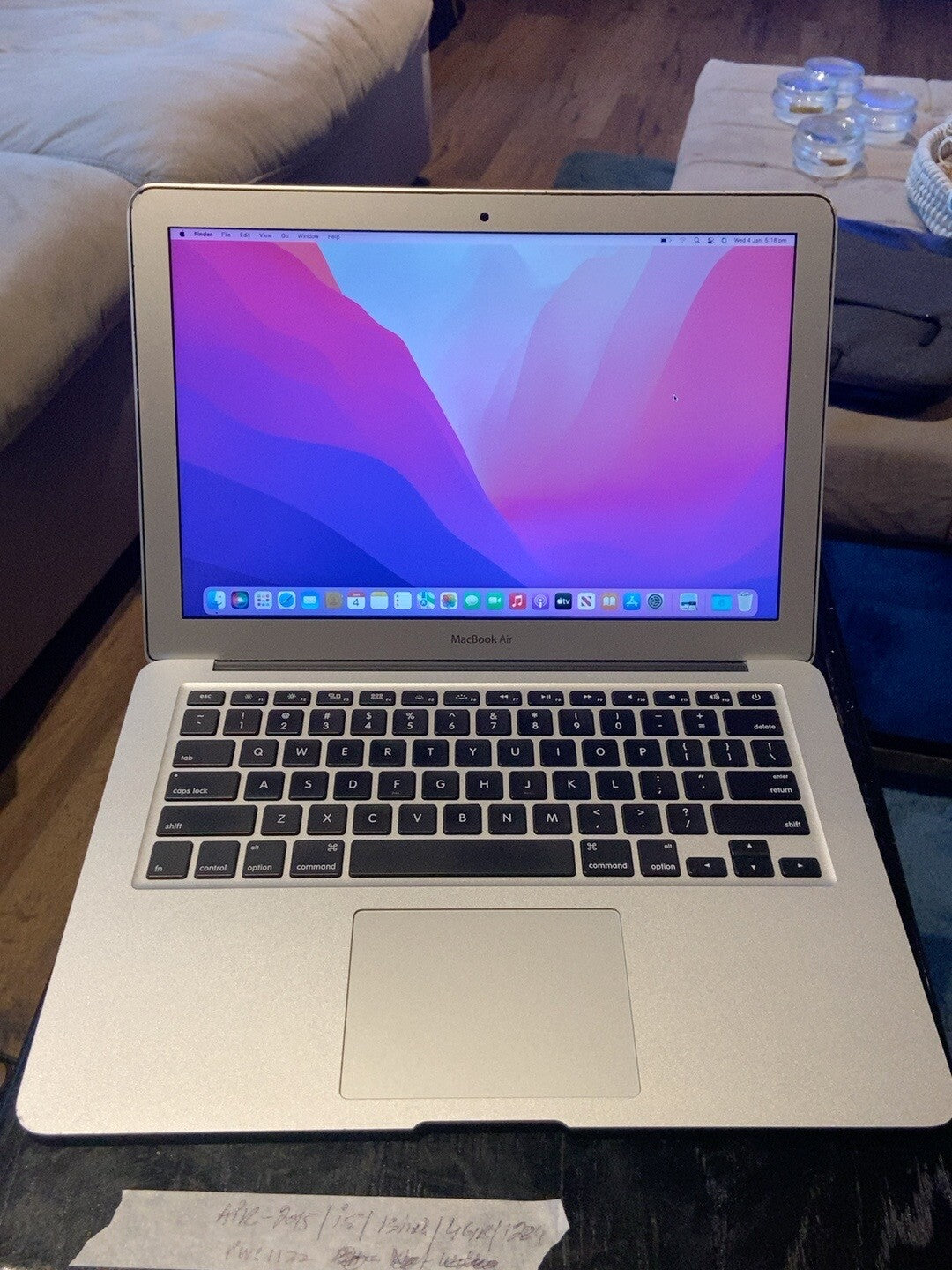Original actual-condition photo of Apple MacBook Air 13.3-inch 2015 with room background