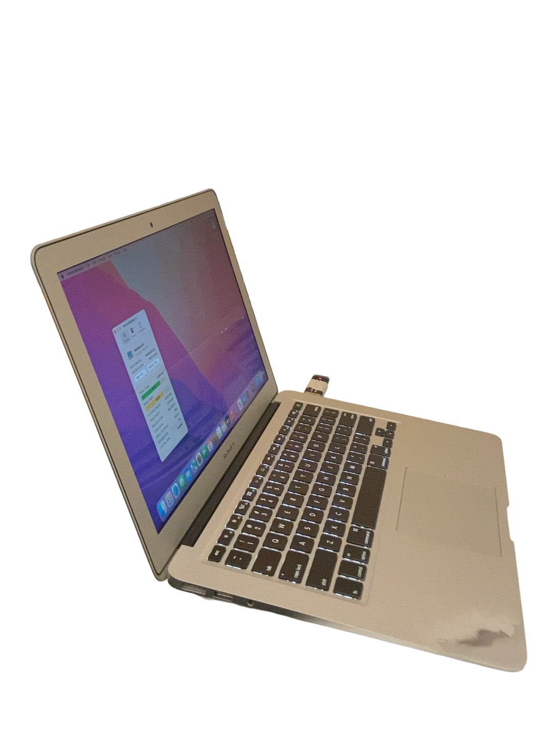 Actual Apple MacBook Air Early 2015 Core i7 keyboard and palm rest on white background