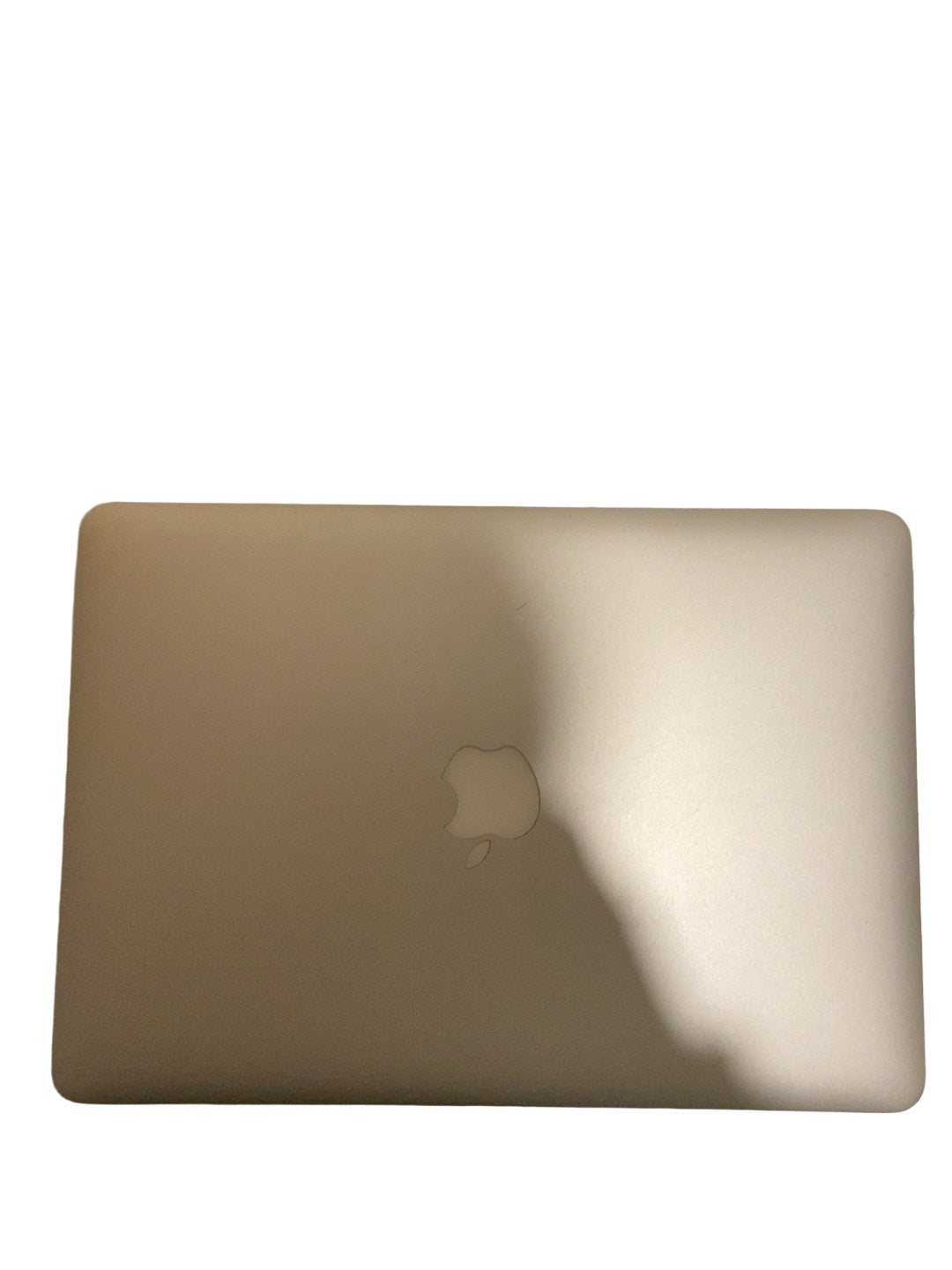 Actual Apple MacBook Air 13.3-inch 2017 lid condition on white background