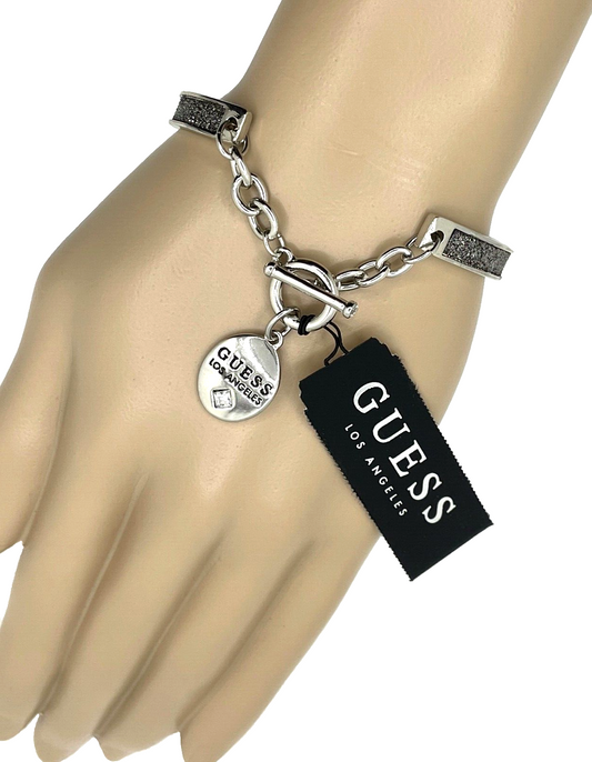 GUESS • Authentic Silver Fashion Bangle Bracelet with Logo Charm • Brand New with Tags